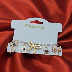 Golden Charm Bow & Star Bracelet
